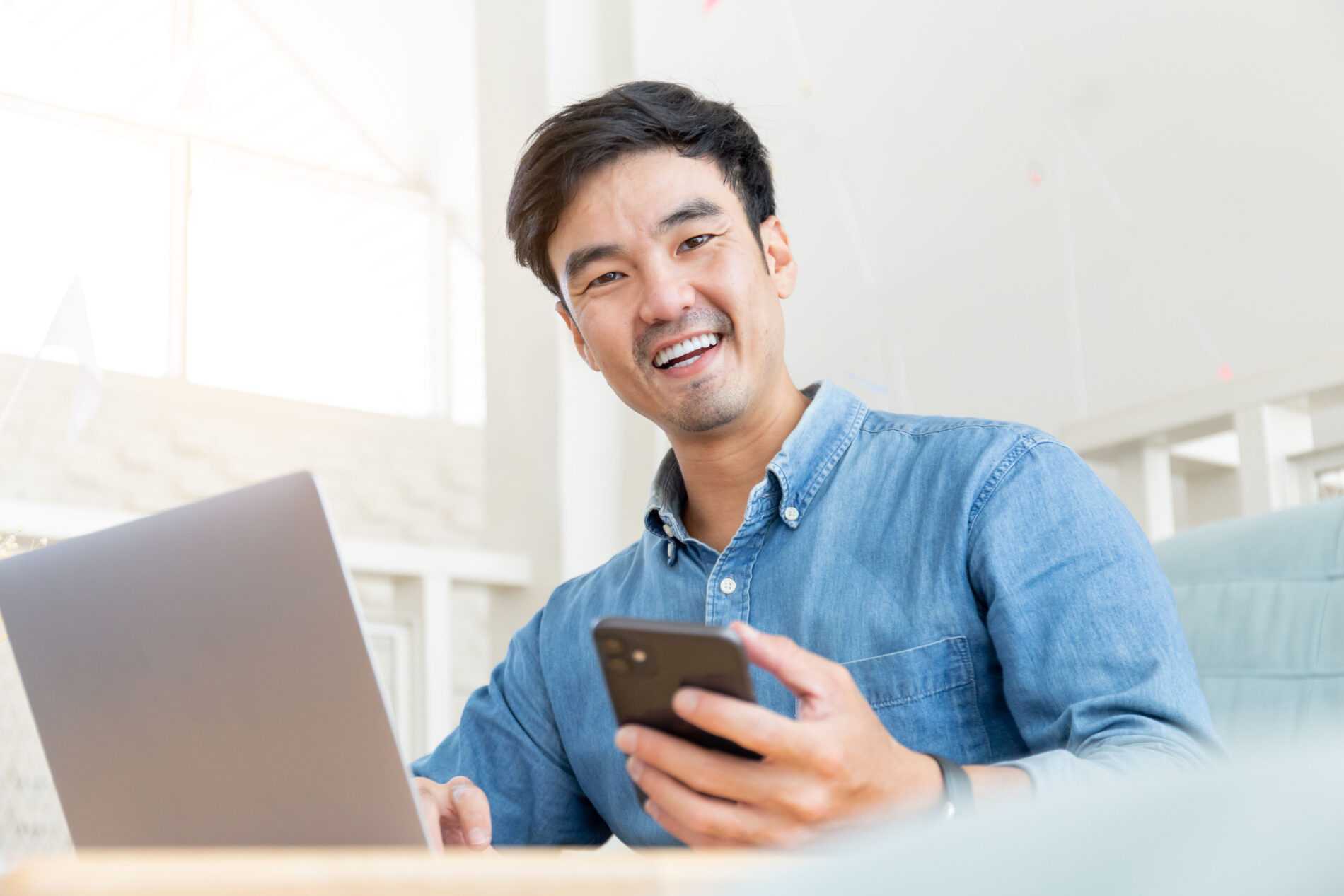 Man,Work,Using,Typing,Computer,Texting,Cell,Phone.student,Study,Education Social Media Marketing